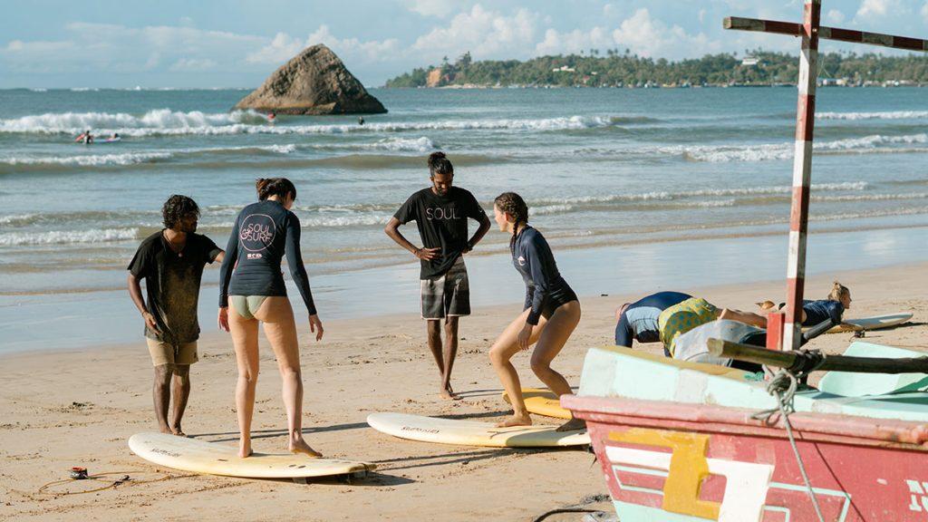 Surf instructors giving coaching at beginner surf camp Sri Lanka