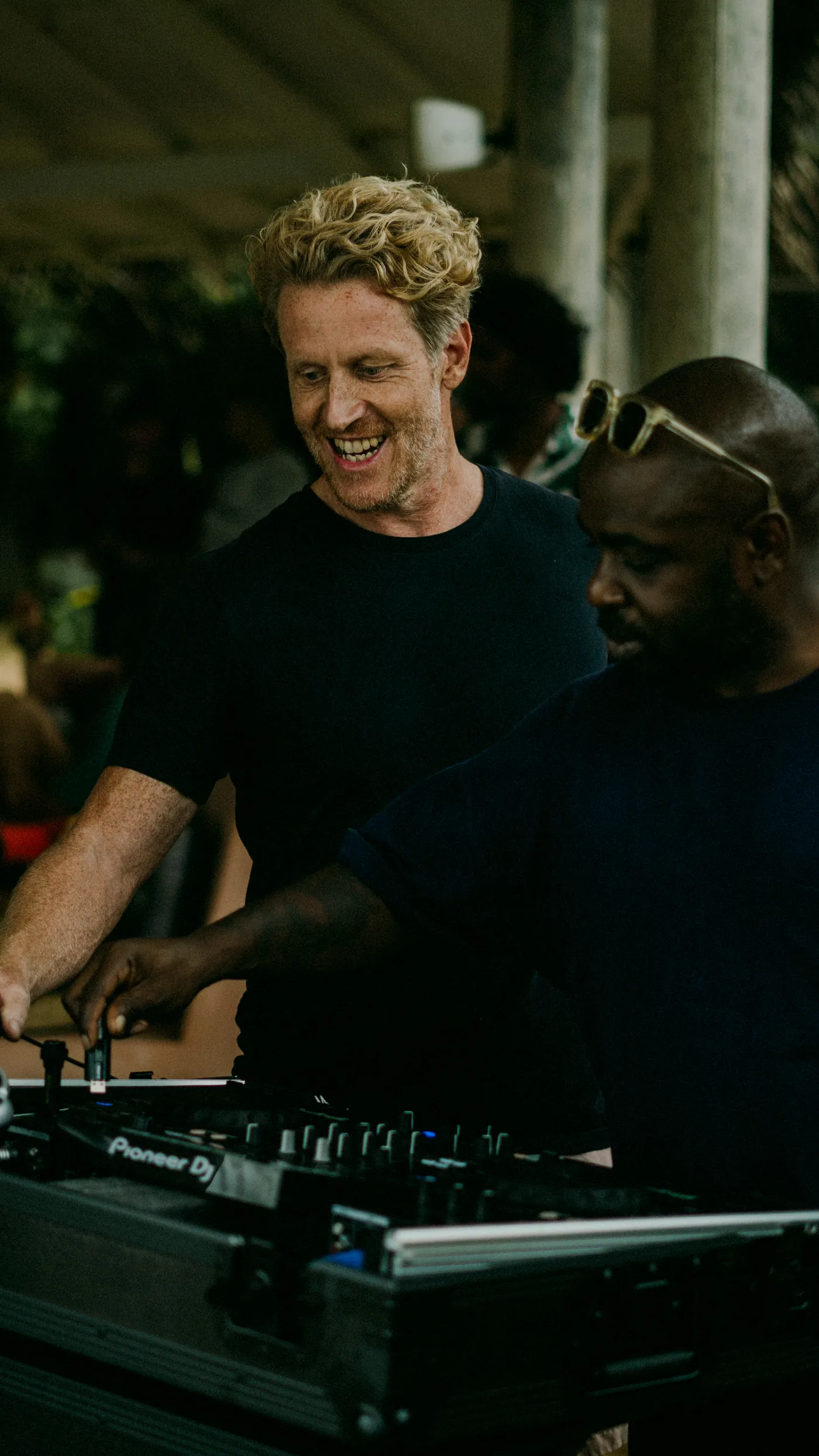 Ed Templeton smiling behind the decks at Cove Surf Jam